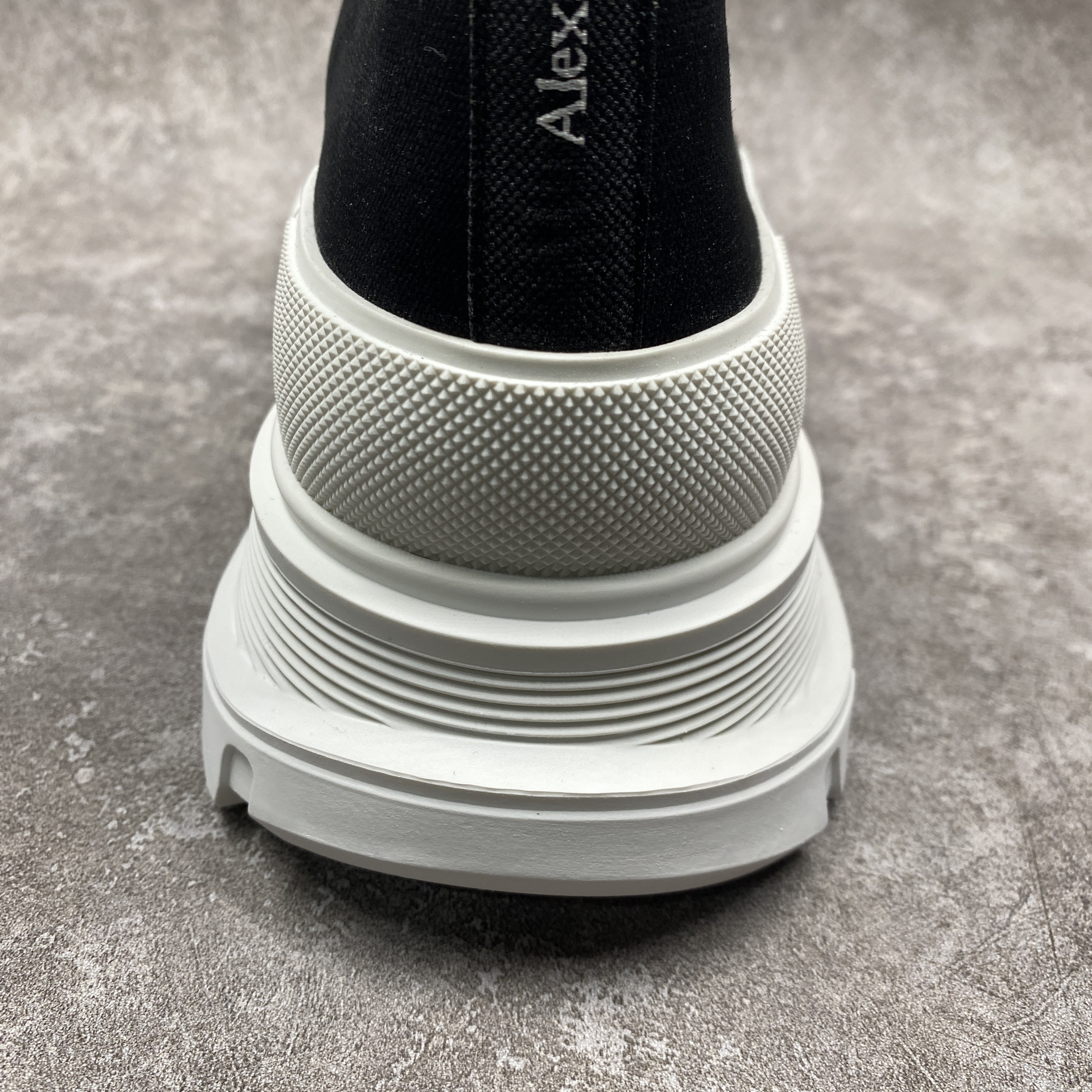 ale*d*r M*Q*en tread slick high lace up boot black white