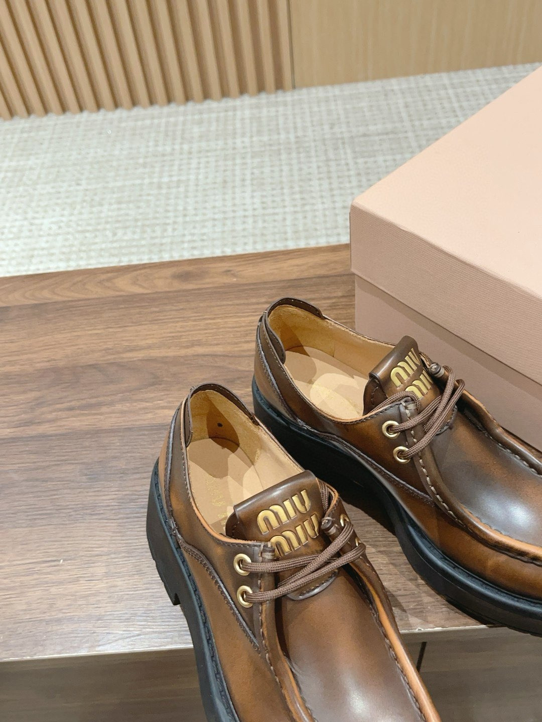 UA Miu Miu Laced Fumé Leather Loafers