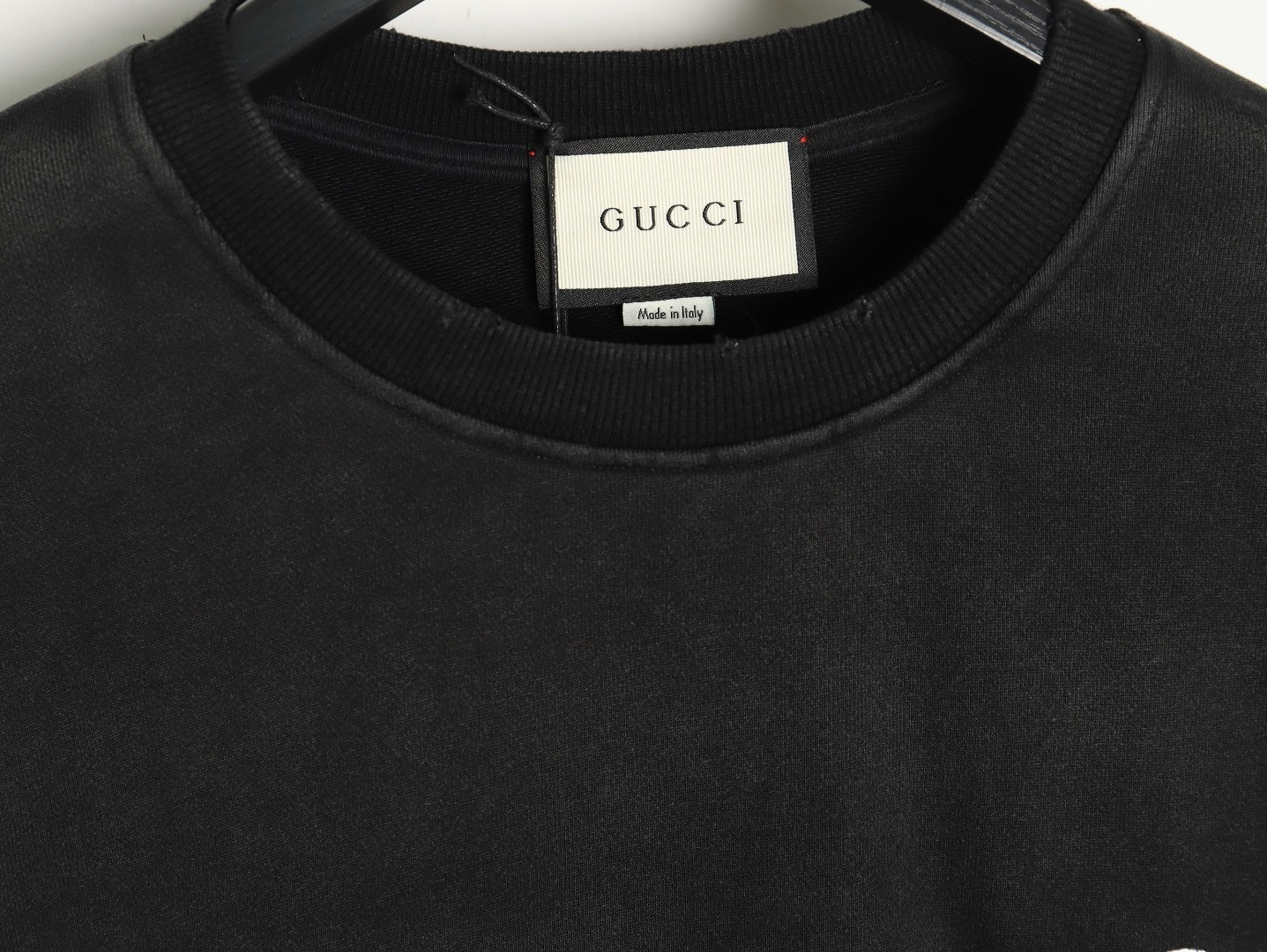 G*u*i hoodies