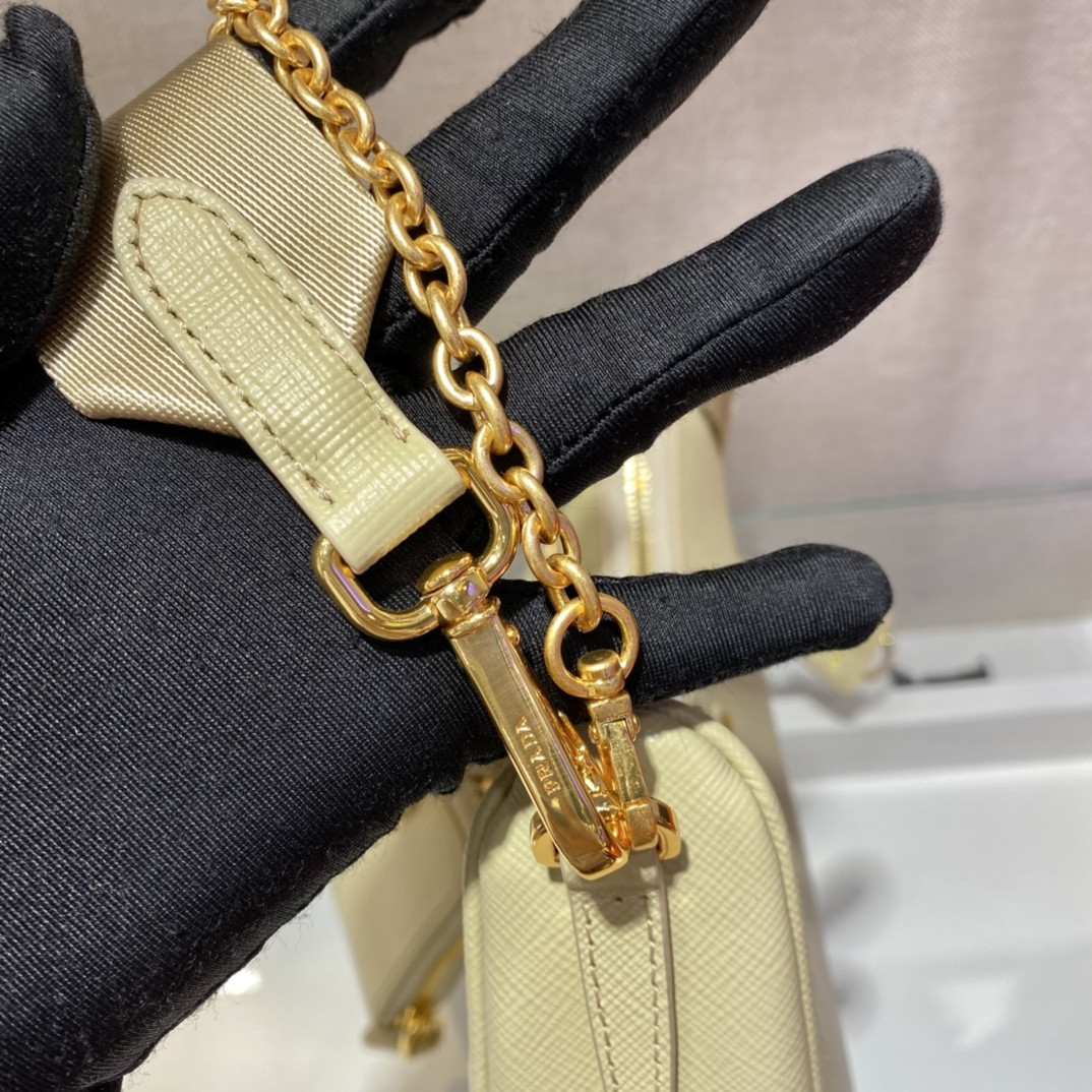 Pra*a re-edition 2005 saffiano leather bag yellow
