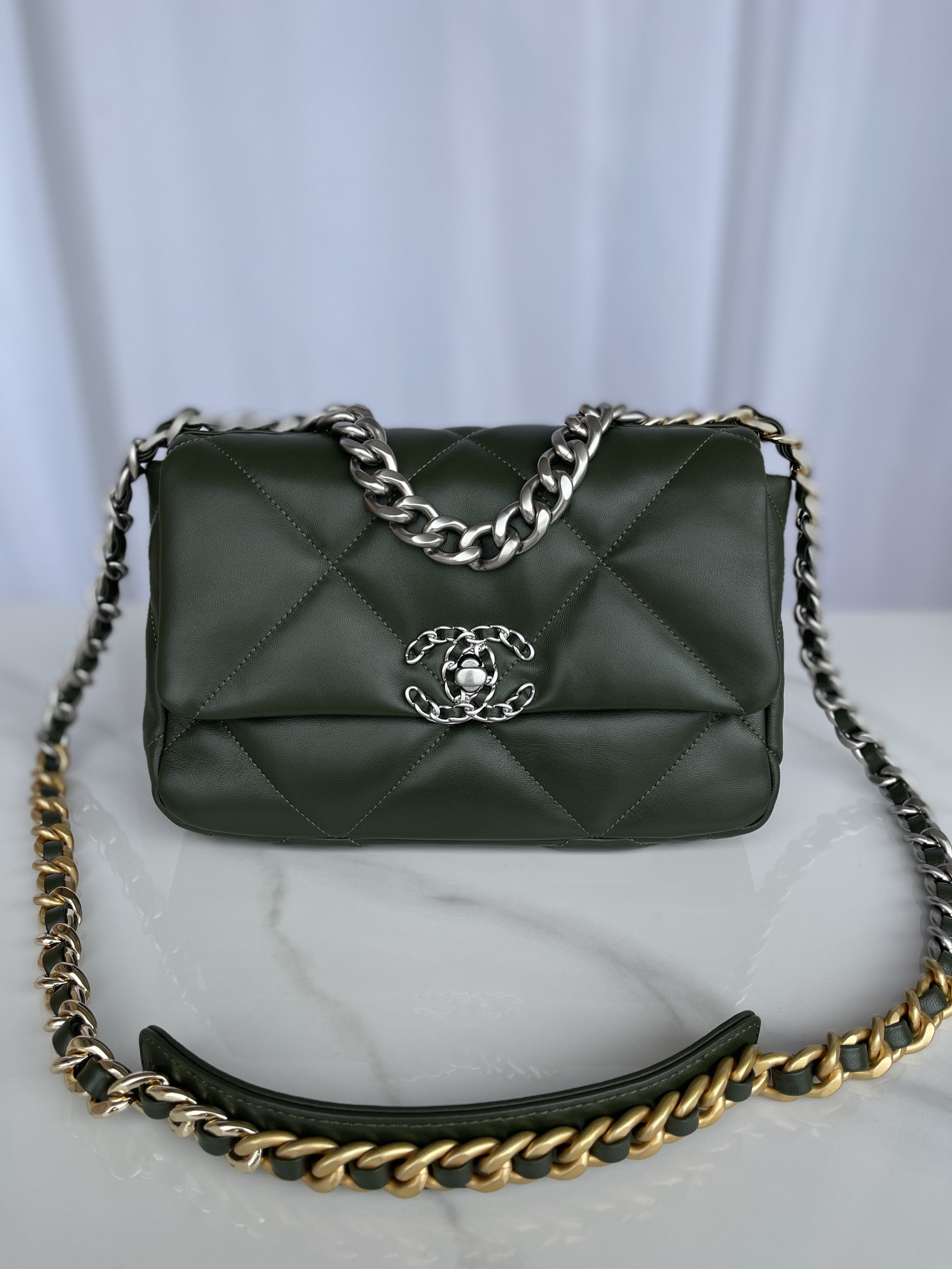 Ch*el 19 handbag shiny leather, gold-tone, silver-tone & ruthenium-finish metal dark green 6.2 × 10.1 × 3.5 in