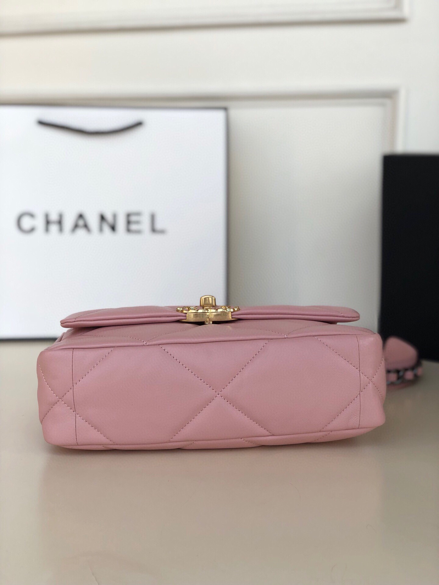 Ch*el 19 handbag shiny leather, gold-tone, silver-tone & ruthenium-finish metal light pink 6.2 × 10.1 × 3.5 in