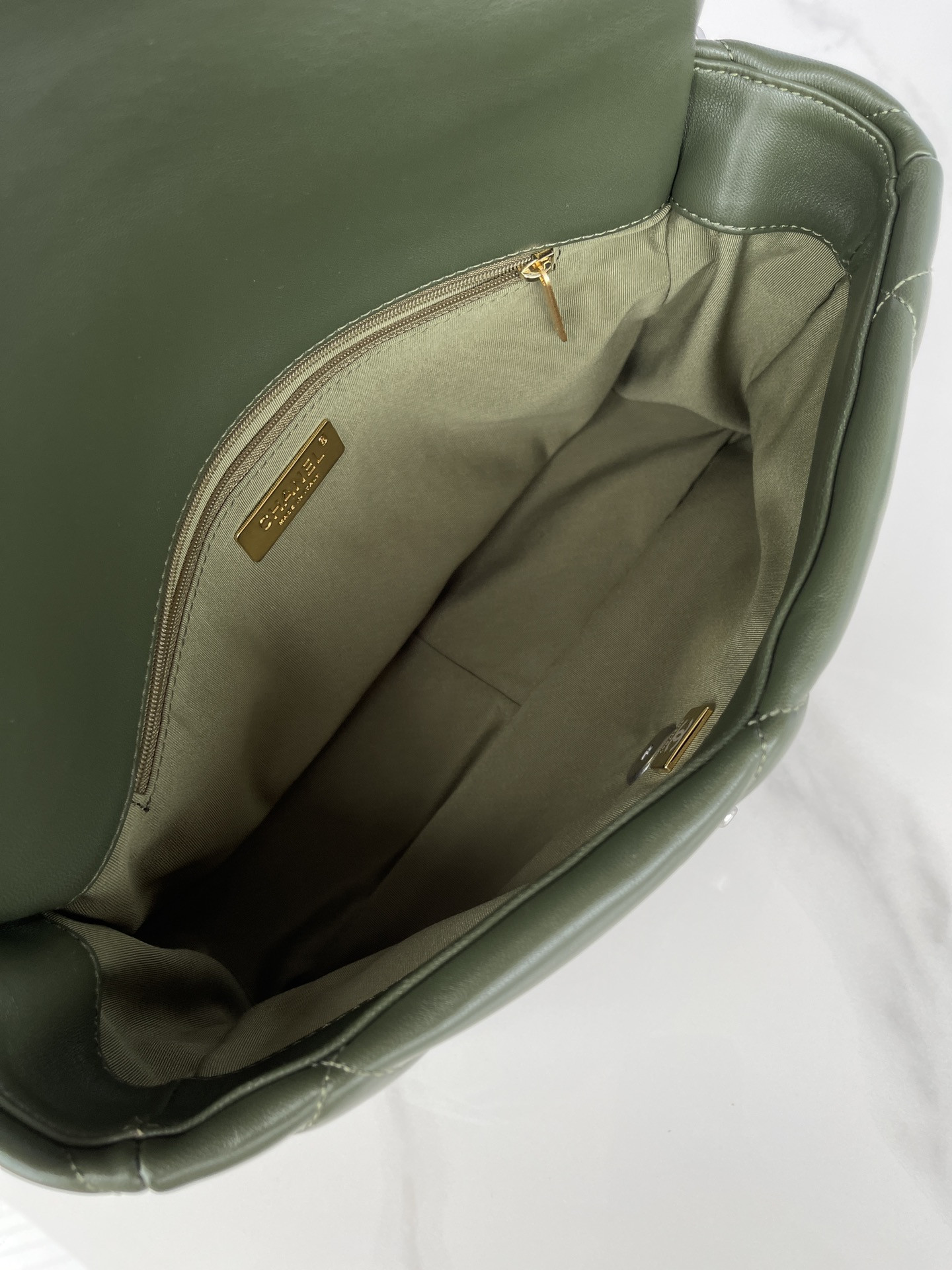 Ch*el 19 large handbag shiny leather, gold-tone, silver-tone & ruthenium-finish metal dark green 7.8 × 11.7 × 3.9 in