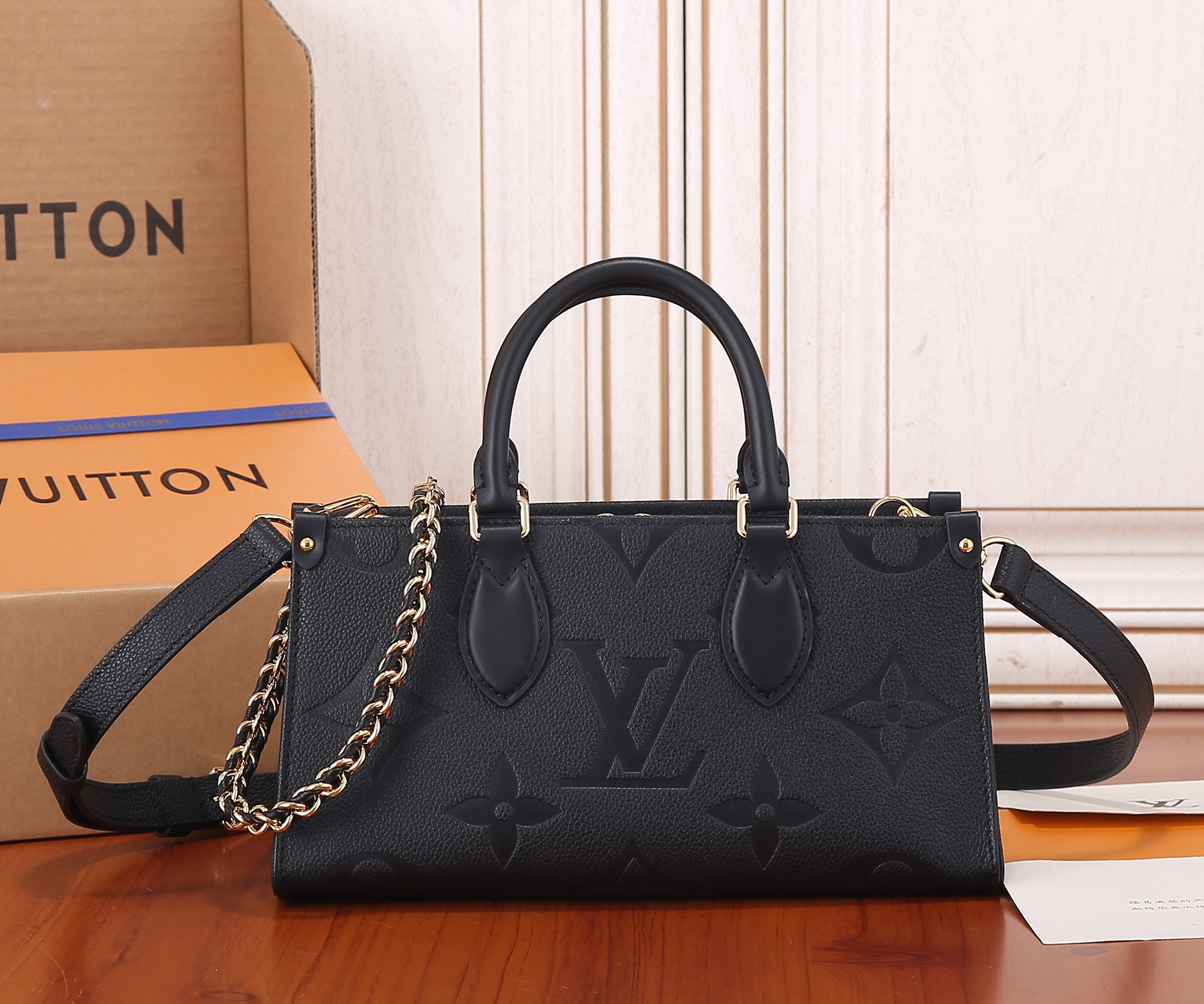 LV OnTheGo East West M23640 9.8 x 5.1 x 3.9 inches