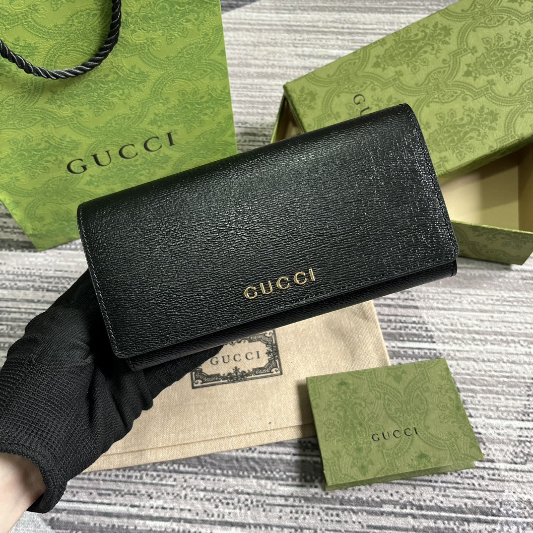continental wallet with G*u*i script  7.5"w x 4"h x 1.4"d