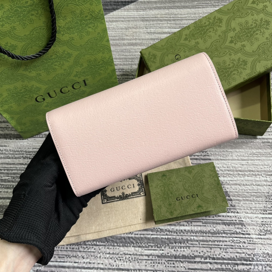 continental wallet with G*u*i script pink 7.5"w x 4"h x 1.4"d