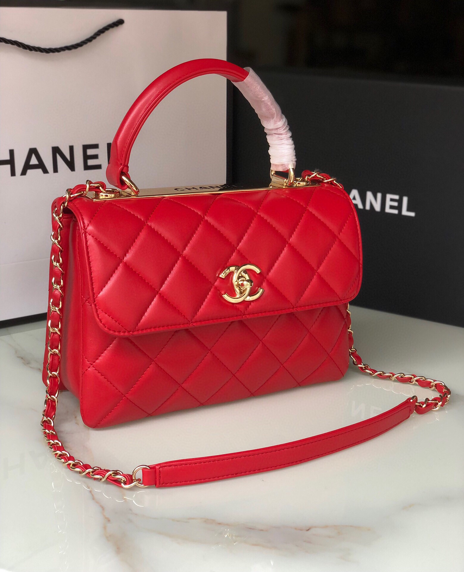 Ch*el flap bag with top handle 6.6 × 9.8 × 4.7 in