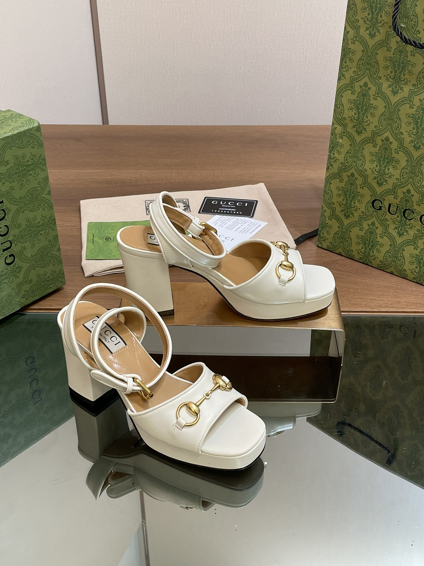 ua G*u*i horsebit platform sandal