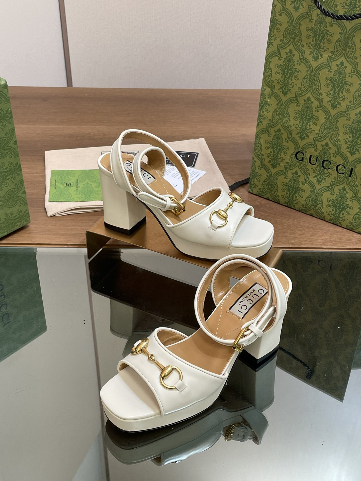 ua G*u*i horsebit platform sandal