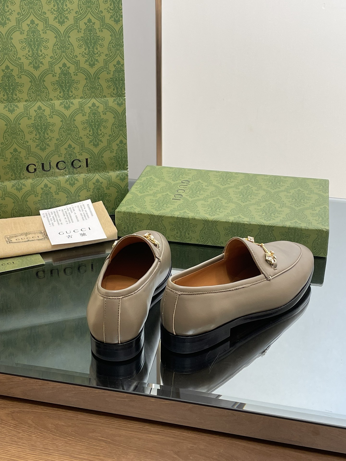 ua G*u*i horsebit loafer