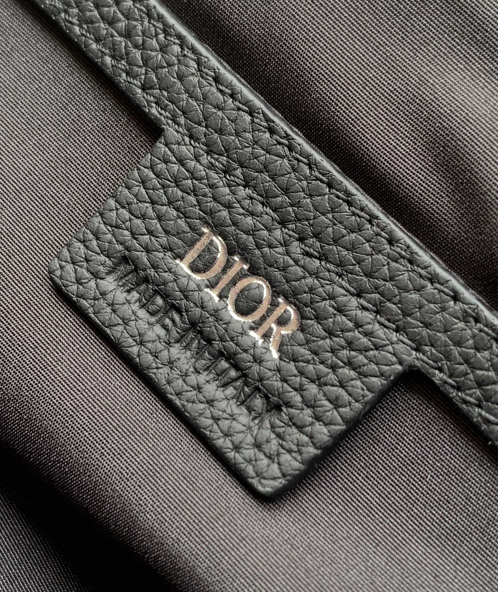 D*or hit the road messenger bag with flap black D*or gravity leather and black grained calfskin 24 x 18 x 8 cm
