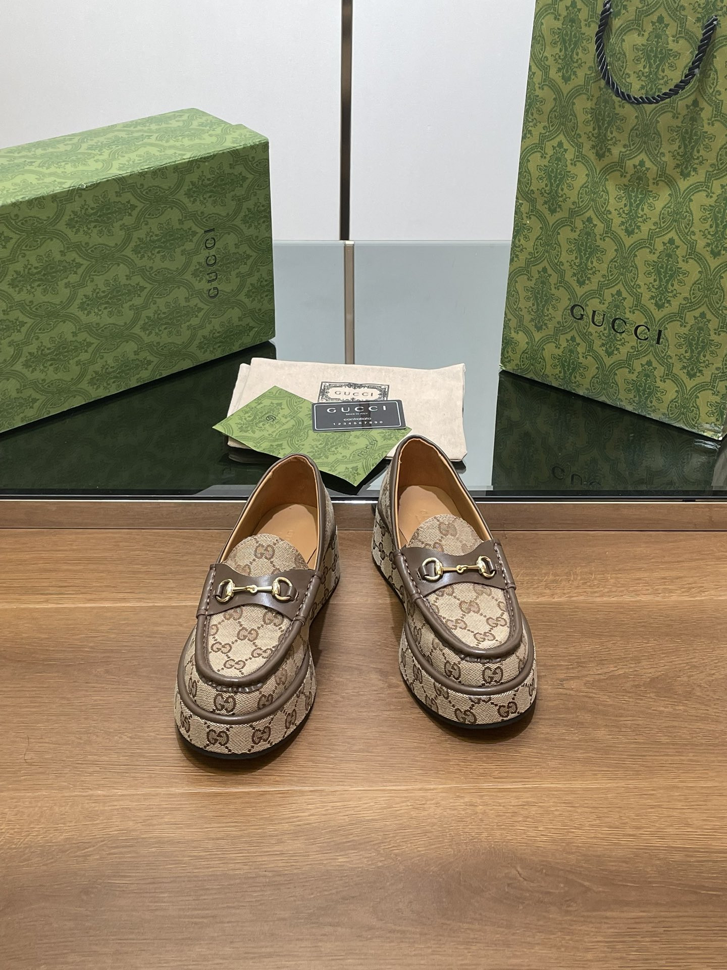 ua G*u*i horsebit wedge loafer
