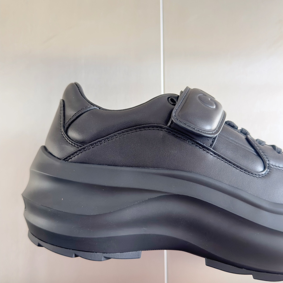 ua G*u*i wave wedge sneaker