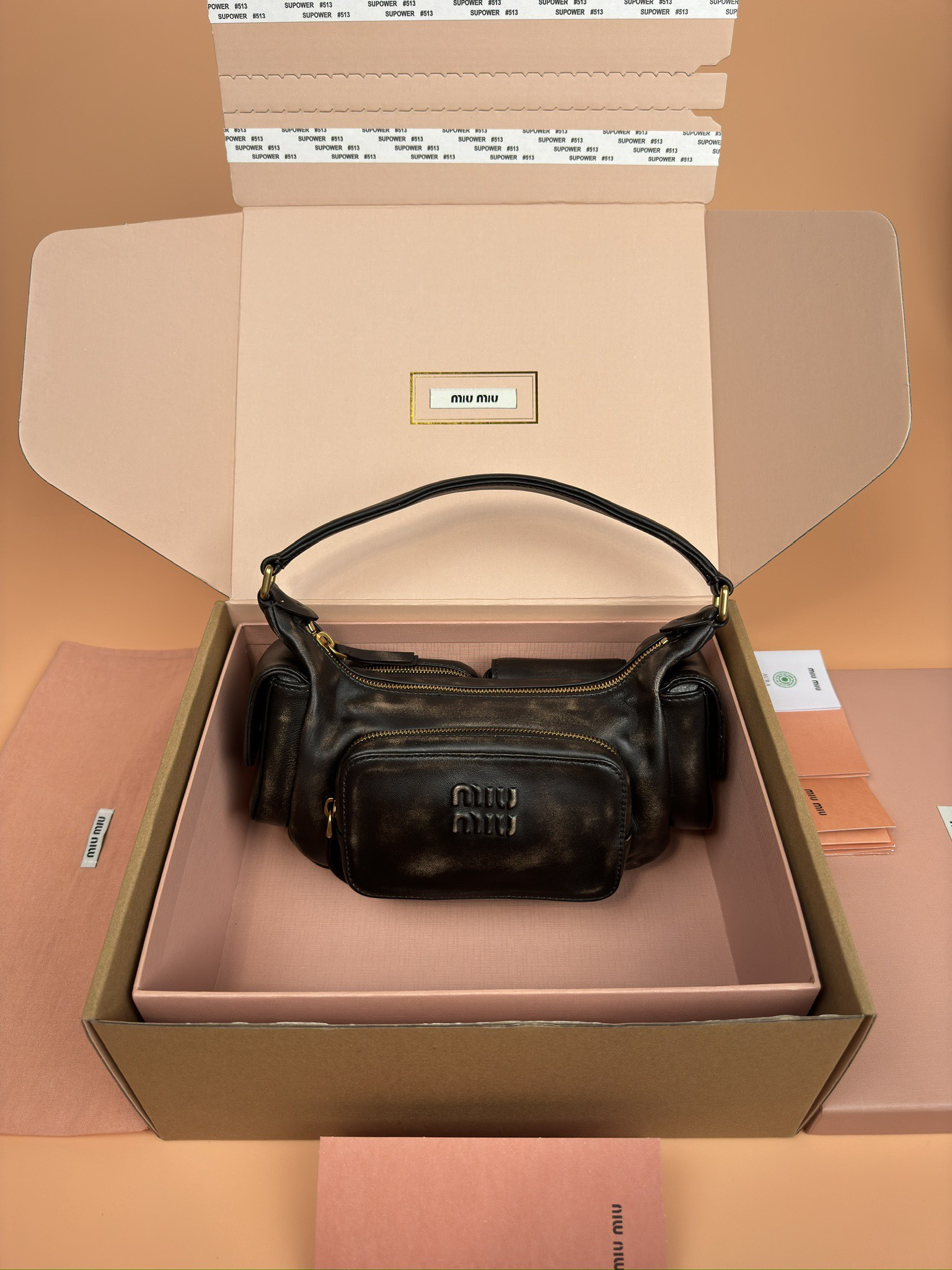 Miu Miu Hobo Nappa leather pocket bag 12x21x6cm