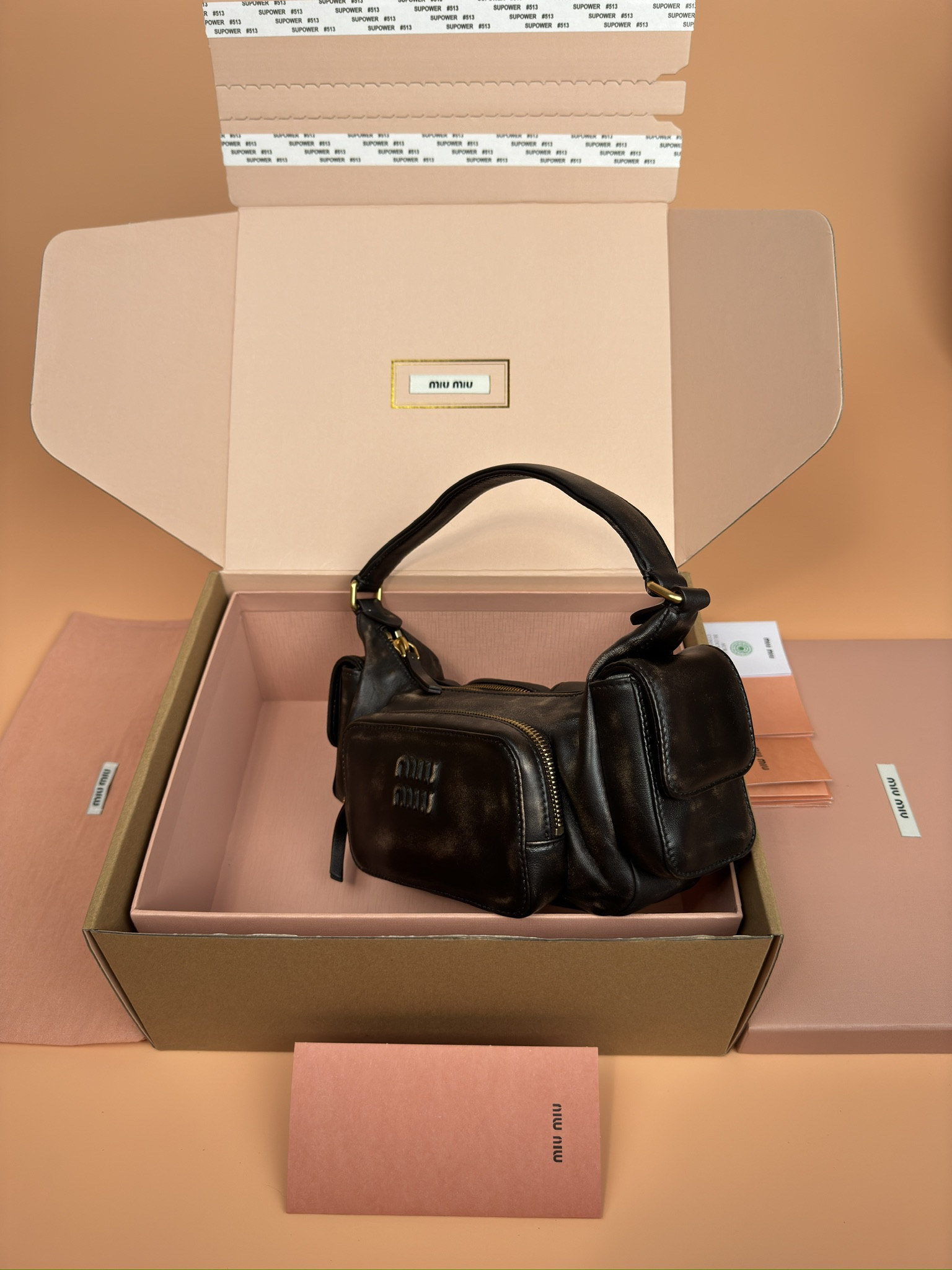 Miu Miu Hobo Nappa leather pocket bag 12x21x6cm