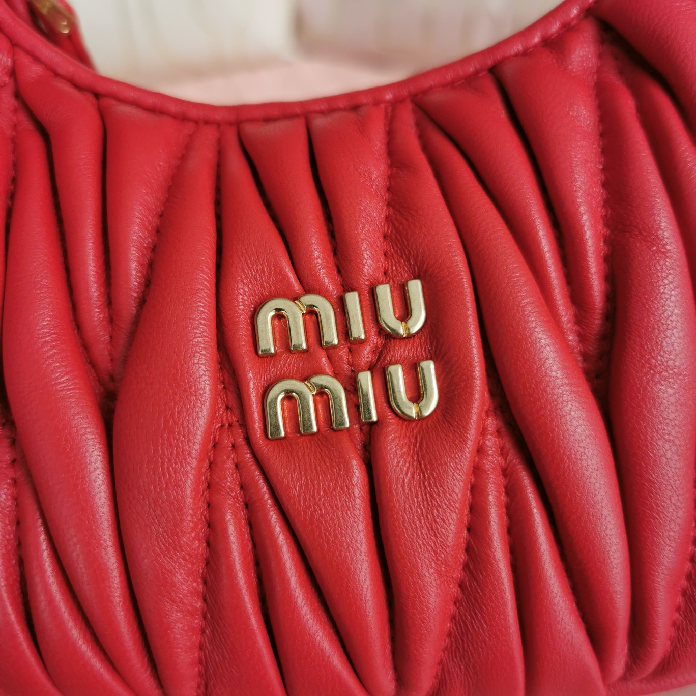 Miu Miu Wander matelassé nappa leather hobo mini-bag 14x17.5x5.5cm