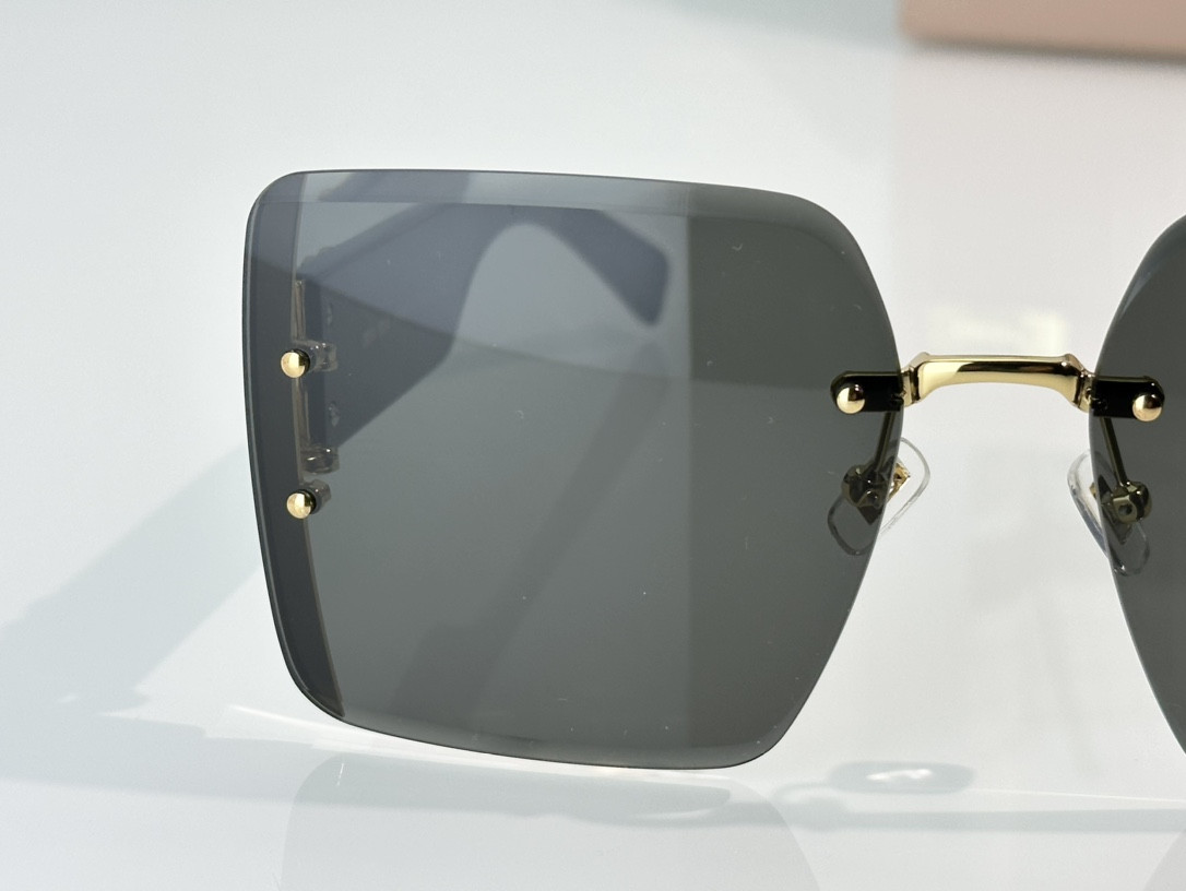 Miu Miu Glasses SMU78V 64-17-140
